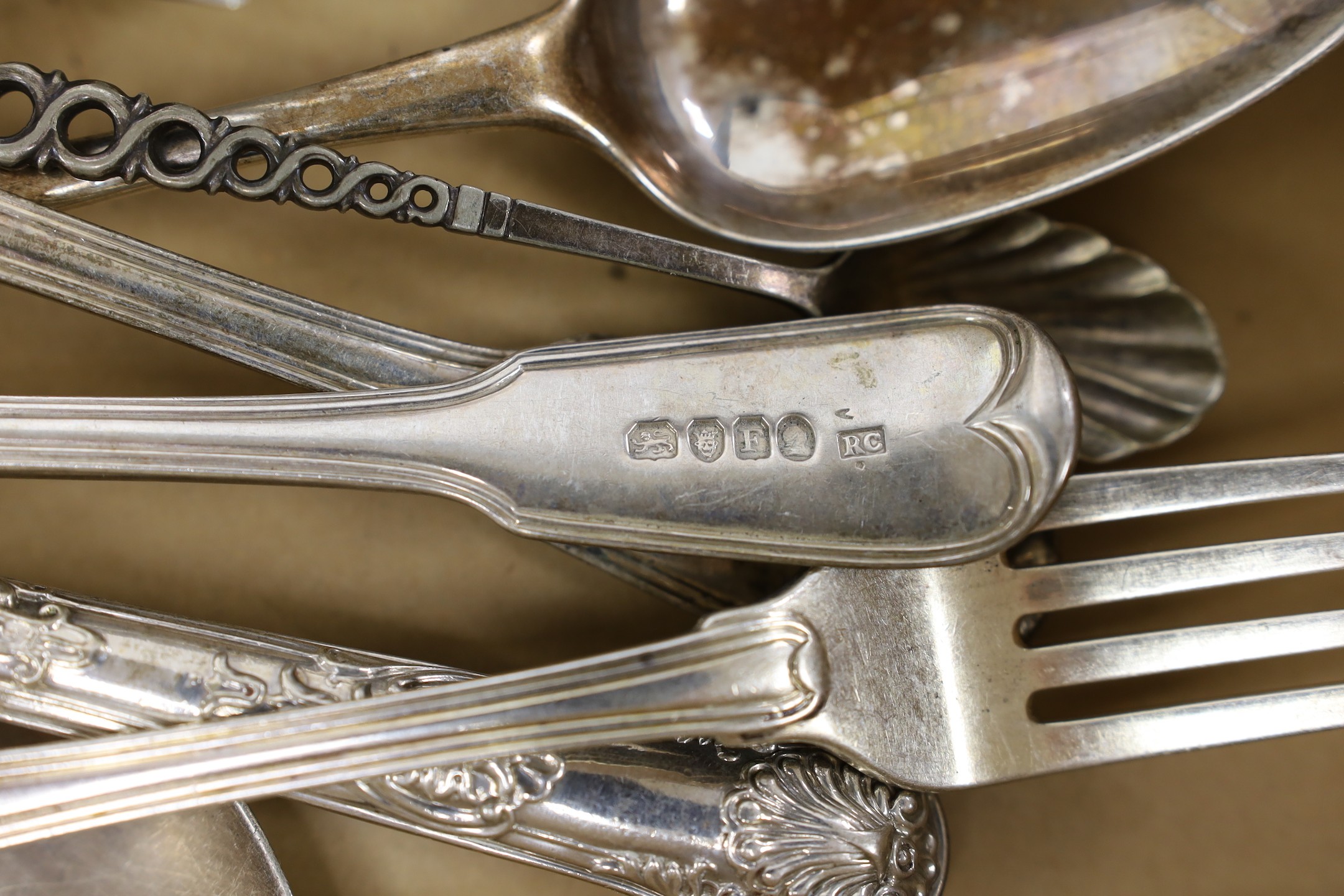 A quantity of assorted mainly 19th century and later silver flatware including ten items of fiddle and thread by Richard Crossley, London, 1801 and a plated teaspoon, weighable silver 72 oz.